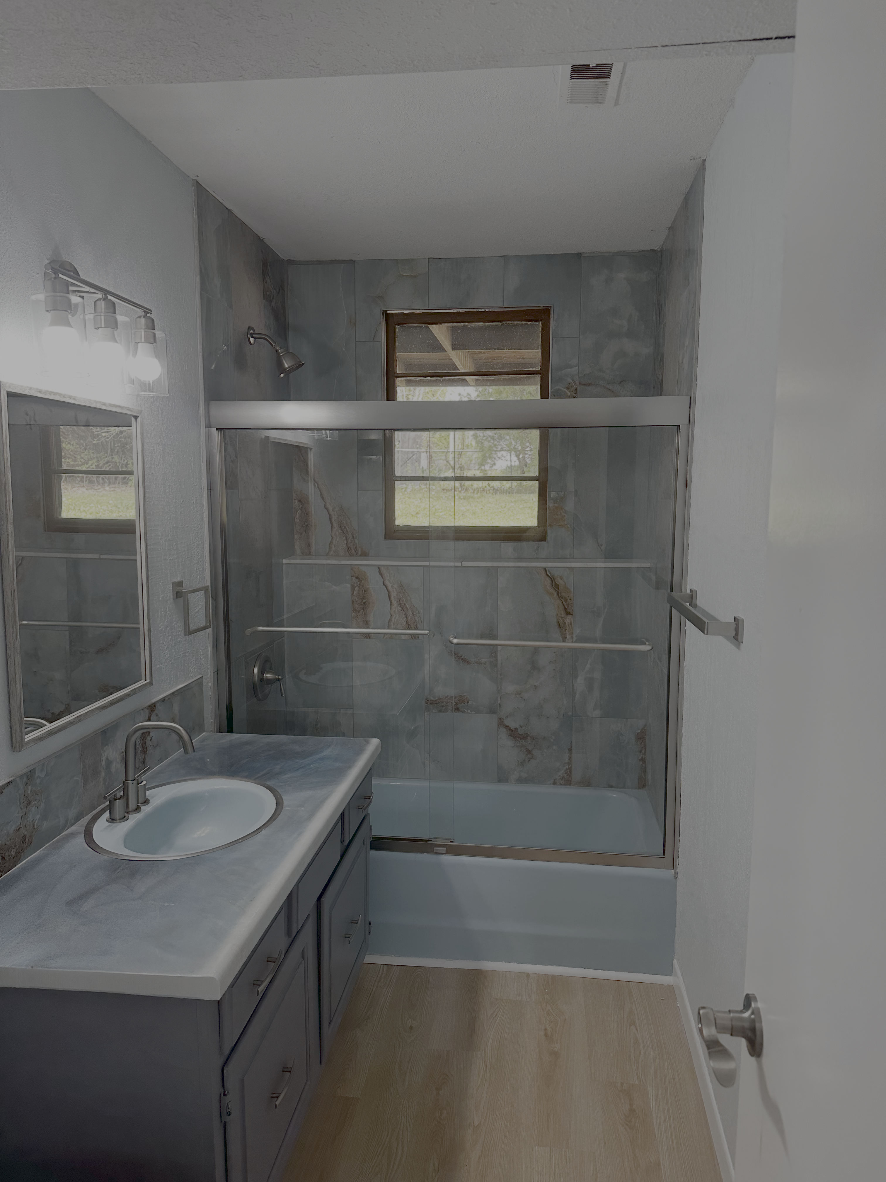 Bathroom remodel by Waylon James Properties - Real estate investment renovation